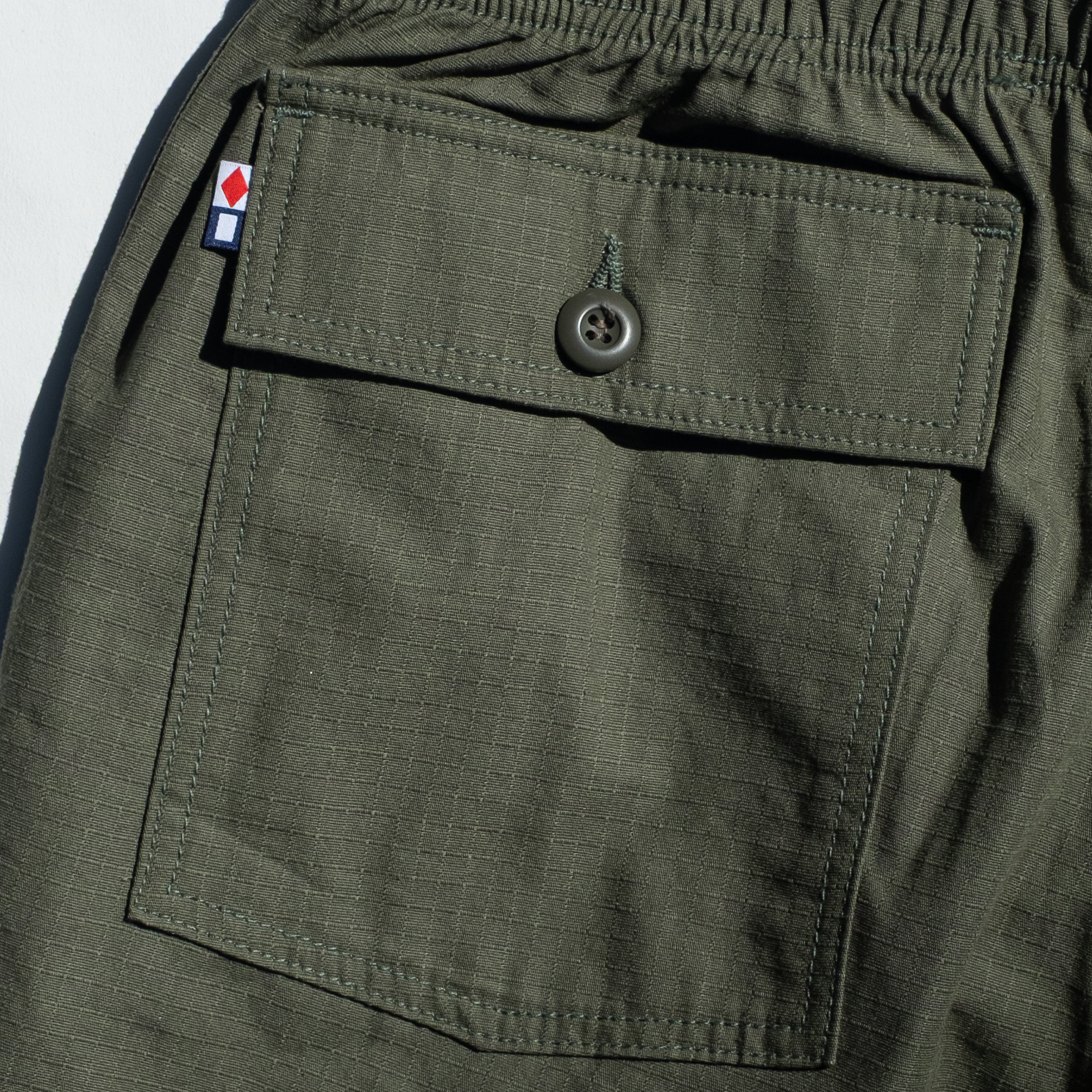 Favorite Pastime Cruiser Pant Army Green – rear flap pocket and Foxtrot Papa flag detail